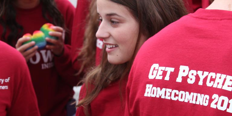 student woman in group, smiling